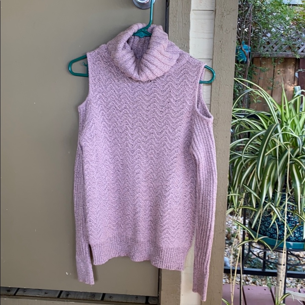 Sweater with shoulder cutout